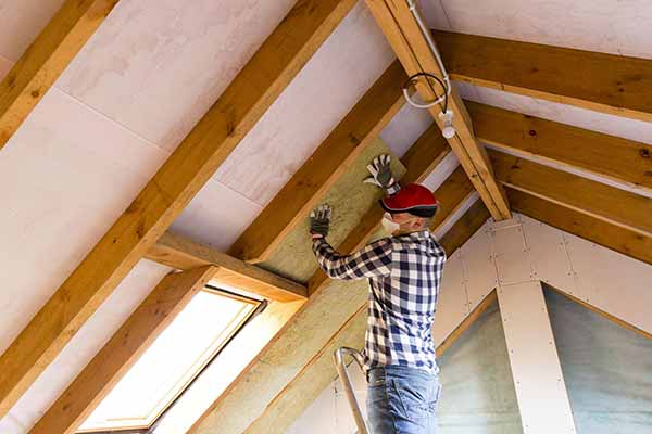Home Insulation House Insulating | Worker Installs