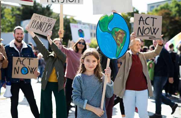 Earth Day Celebrated | Photo of Crowd supporting Planet and Climate Change