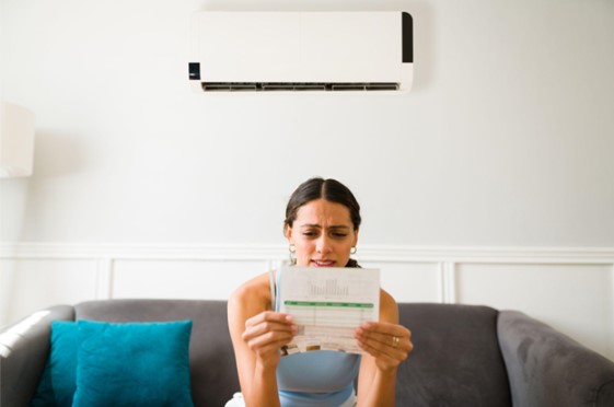 A woman distressed about a bill
